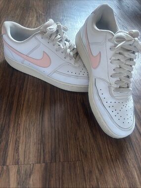 Nike Women's White Sneakers with Pink Swoosh